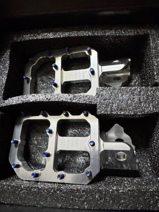 Titanium chrome wide pegs